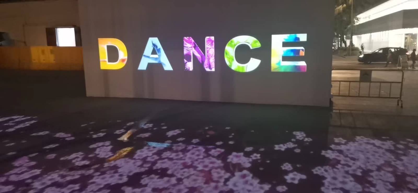 Visitors engaging with interactive projection at Tai Po Music & Art Center